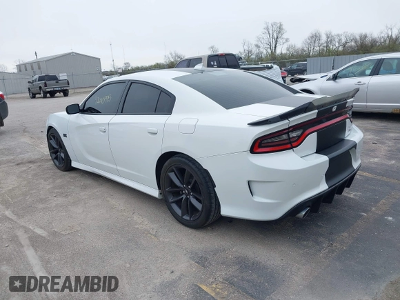 2019 Dodge Charger Scat Pack with VIN 2C3CDXGJXKH635612, listed as a IAAI auction lot 42010995 with 34,860 mi miles and . Bid and sale history available at DreamBid. Image 3.