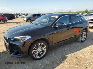 2022 BMW X2 sDrive28i with VIN WBXYH9C06N5U22766, listed as a Copart auction lot 63989514 with 42,922 mi miles and Salvage Title. Bid and sale history available at carsss.com. Image 1.