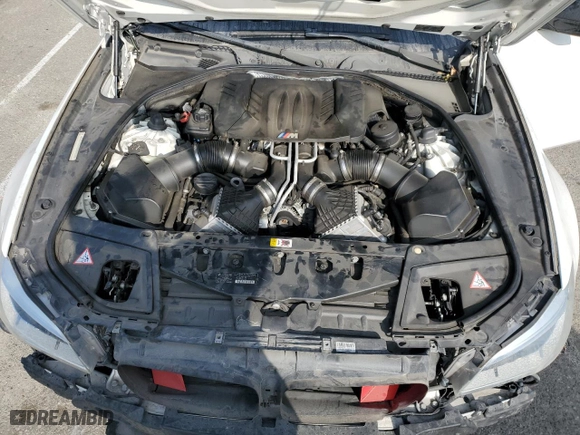 2014 BMW M5 with VIN WBSFV9C56ED097642, listed as a Copart auction lot 87054484 with 77,022 mi miles and Salvage Title. Bid and sale history available at carsss.com. Image 11.