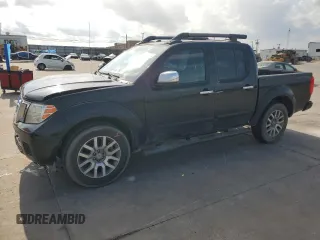 2011 Nissan Frontier SL with VIN 1N6AD0ER0BC439214, listed as a Copart auction lot 64893724 with 197,414 mi miles and Salvage title. Bid and sale history available at DreamBid. Image 1.