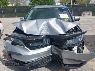 2022 Honda Pilot Special Edition with VIN 5FNYF5H21NB012512, listed as a IAAI auction lot 40677729 with 202,674 mi miles and . Bid and sale history available at carsss.com. Image 12.