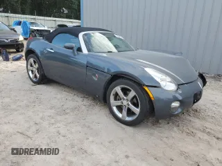 2009 Pontiac Solstice z VIN 1G2MN35B69Y105093, wystawiony jako Copart lot #72854034 z przebiegiem 82 333 mil mil oraz Szkoda całkowita • Salvage title. Historia ofert i sprzedaży dostępna na DreamBid. Obrazek 4.