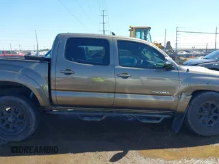 2012 Toyota Tacoma z VIN 5TFLU4EN9CX047925, wystawiony jako IAAI lot #41661700 z przebiegiem 219 158 mil mil oraz . Historia ofert i sprzedaży dostępna na DreamBid. Obrazek 13.