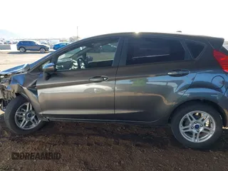 2019 Ford Fiesta SE with VIN 3FADP4EJ8KM101816, listed as a IAAI auction lot 41615459 with 71,028 mi miles. Bid and sale history available at carsss.com. Image 14.