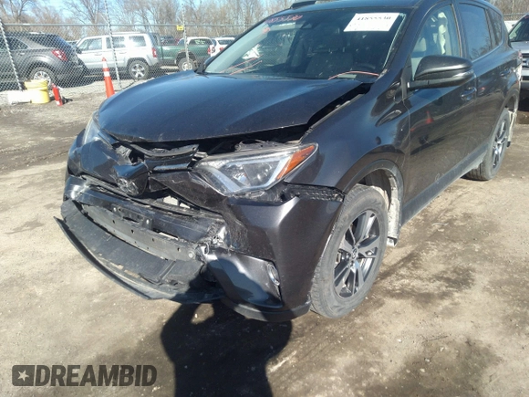 2018 Toyota RAV4 XLE with VIN JTMRFREV9JJ742276, listed as a IAAI auction lot 41855530 with 115,815 mi miles. Bid and sale history available at carsss.com. Image 6.