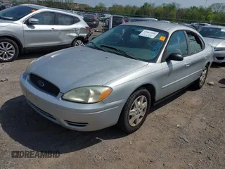 2006 Ford Taurus SE with VIN 1FAFP53U66A101635, listed as a IAAI auction lot 42067998 with 208,734 mi miles. Bid and sale history available at carsss.com. Image 2.