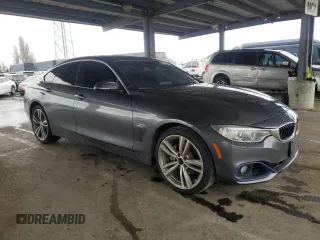 2016 BMW 4 Series 428i xDrive z VIN WBA4C9C57GG137245, wystawiony jako Copart lot #50944415 z przebiegiem 101 740 mil mil oraz Szkoda całkowita • Salvage title. Historia ofert i sprzedaży dostępna na DreamBid. Obrazek 4.
