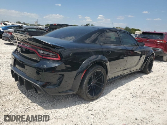 2021 Dodge Charger SRT Hellcat Widebody z VIN 2C3CDXL93MH660916, wystawiony jako Copart lot #51233805 z przebiegiem 27 729 mil mil oraz Czysty tytuł • Clean title. Historia ofert i sprzedaży dostępna na DreamBid. Obrazek 3.