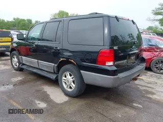 2003 Ford Expedition Special Service with VIN 1FMPU16L83LC08166, listed as a IAAI auction lot 42036745 with 198,948 mi miles. Bid and sale history available at carsss.com. Image 3.