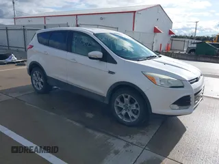 2013 Ford Escape SEL with VIN 1FMCU9H94DUB29989, listed as a IAAI auction lot 42075895 with 147,242 mi miles and . Bid and sale history available at DreamBid. Image 1.
