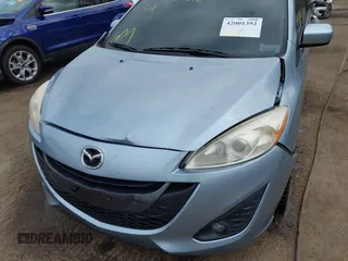 2012 Mazda 5 Grand Touring with VIN JM1CW2DL4C0141511, listed as a IAAI auction lot 42001392 with 99,097 mi miles and . Bid and sale history available at carsss.com. Image 6.