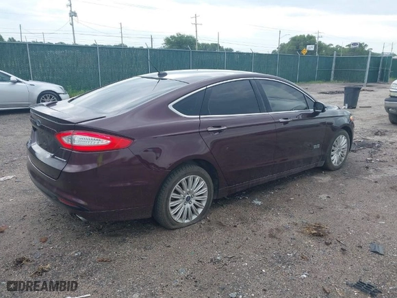 2013 Ford Fusion Energi Titanium with VIN 3FA6P0SU9DR272810, listed as a IAAI auction lot 39871333 with 80,073 mi miles. Bid and sale history available at carsss.com. Image 4.