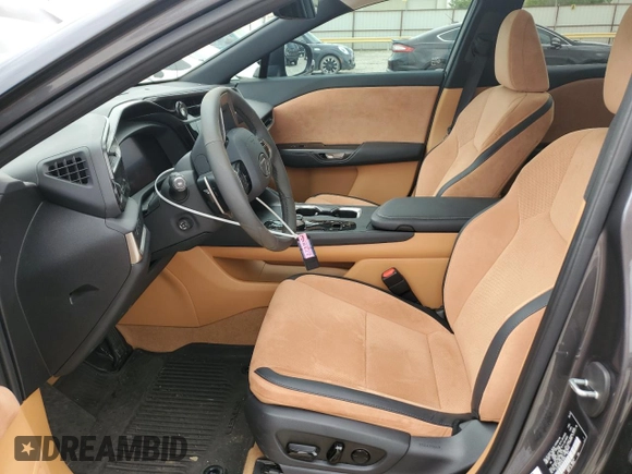 2023 Lexus RZ 450e Premium z VIN JTJAAAAB2PA010568, wystawiony jako Copart lot #53693974 z przebiegiem 12 046 mil mil oraz Szkody całkowita. Historia ofert i sprzedaży dostępna na DreamBid. Obrazek 7.