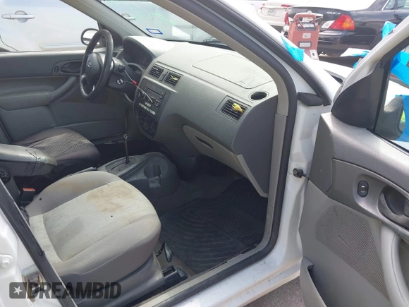 2005 Ford Focus S with VIN 1FAFP34N85W245314, listed as a IAAI auction lot 42680320 with 249,306 mi miles and . Bid and sale history available at DreamBid. Image 5.