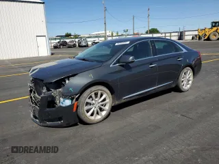2013 Cadillac XTS Luxury z VIN 2G61R5S32D9216672, wystawiony jako Copart lot #58392955 z przebiegiem 94 272 mil mil oraz Szkoda całkowita • Salvage title. Historia ofert i sprzedaży dostępna na DreamBid. Obrazek 1.