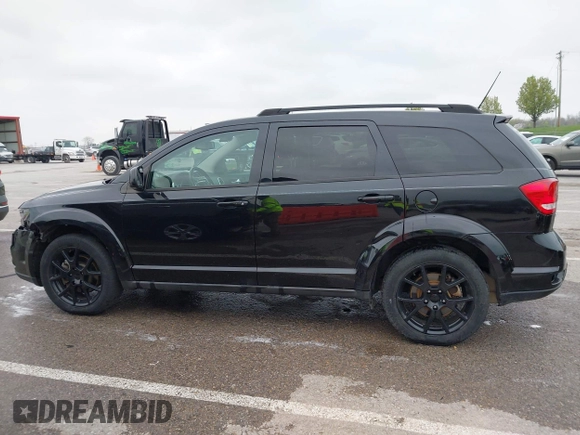 2013 Dodge Journey SXT with VIN 3C4PDDBG4DT660474, listed as a IAAI auction lot 41984607 with 124,926 mi miles and . Bid and sale history available at DreamBid. Image 15.