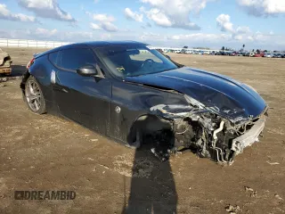 2013 Nissan 370Z with VIN JN1AZ4EH8DM382277, listed as a Copart auction lot 39709824 with 118,925 mi miles and Salvage Title. Bid and sale history available at carsss.com. Image 4.