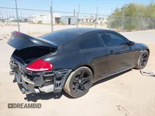2008 BMW 6 Series M6 with VIN WBSEH93558CY24847, listed as a IAAI auction lot 42171734 with 115,795 mi miles. Bid and sale history available at carsss.com. Image 4.