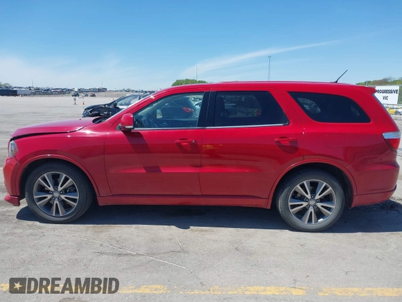2013 Dodge Durango R/T with VIN 1C4SDJCTXDC697240, listed as a IAAI auction lot 42209558 with 130,735 mi miles and . Bid and sale history available at DreamBid. Image 14.