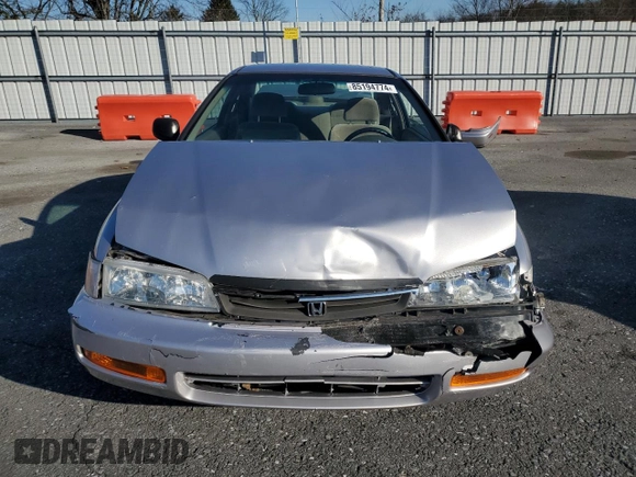 1997 Honda Accord LX with VIN 1HGCD723XVA033754, listed as a Copart auction lot 85194774 with 77,269 mi miles and Salvage Title. Bid and sale history available at carsss.com. Image 5.