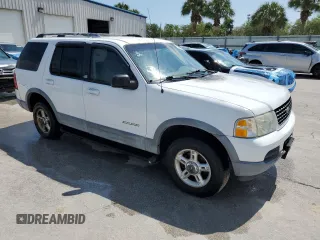 2002 Ford Explorer XLT with VIN 1FMZU63E02UA34534, listed as a Copart auction lot 50587275 with Not Provided miles and Salvage Title. Bid and sale history available at DreamBid. Image 4.