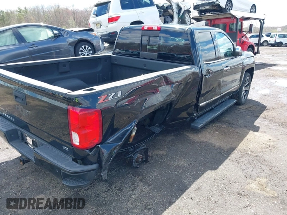 2018 Chevrolet Silverado 1500 with VIN 1GCVKSEC3JZ125571, listed as a IAAI auction lot 41982881 with 58,410 mi miles and . Bid and sale history available at DreamBid. Image 17.