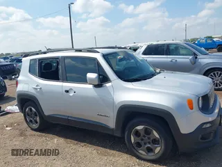 2015 Jeep Renegade Latitude with VIN ZACCJABH0FPB65461, listed as a IAAI auction lot 39756561 with 132,135 mi miles. Bid and sale history available at carsss.com. Image 14.