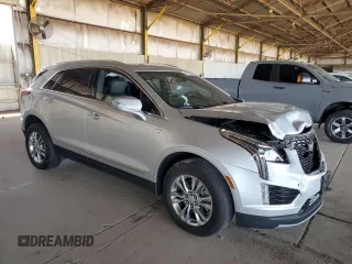 2020 Cadillac XT5 Premium Luxury AWD with VIN 1GYKNDRS4LZ124935, listed as a Copart auction lot 62177965 with 35,671 mi miles and Salvage title. Bid and sale history available at DreamBid. Image 4.
