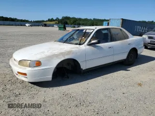 1996 Toyota Camry DX with VIN JT2BG12K7T0351784, listed as a Copart auction lot 52815345 with 303,537 mi miles and Clean Title. Bid and sale history available at carsss.com. Image 1.