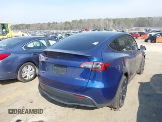 2022 Tesla Model Y Performance with VIN 7SAYGDEF7NF497076, listed as a IAAI auction lot 41759793 with 46,970 mi miles and . Bid and sale history available at DreamBid. Image 4.