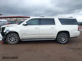 2015 GMC Yukon XL Denali with VIN 1GKS2JKJ2FR590502, listed as a IAAI auction lot 41758575 with 129,777 mi miles. Bid and sale history available at carsss.com. Image 13.