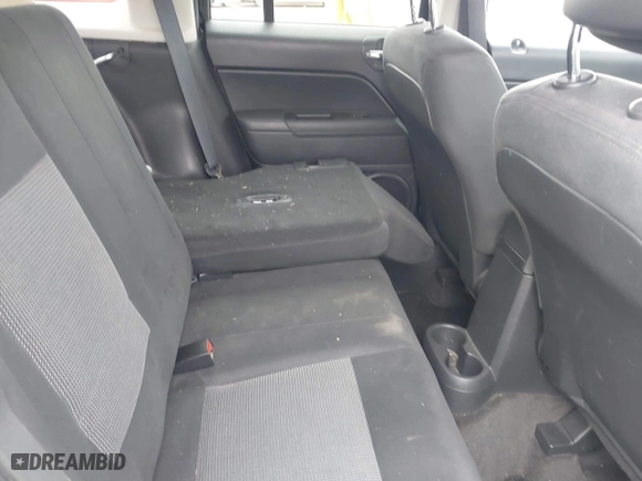 2014 Jeep Patriot Sport with VIN 1C4NJPBA5ED769871, listed as a IAAI auction lot 41146384 with 63,356 mi miles. Bid and sale history available at carsss.com. Image 8.
