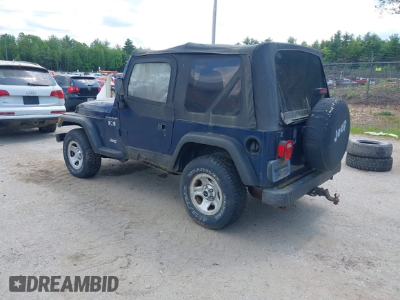 2002 Jeep Wrangler X with VIN 1J4FA39S82P735794, listed as a IAAI auction lot 42411386 with 141,219 mi miles and . Bid and sale history available at DreamBid. Image 3.