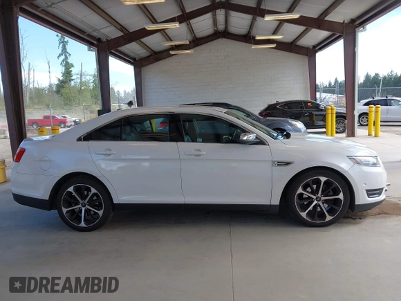 2015 Ford Taurus Limited with VIN 1FAHP2J81FG118224, listed as a IAAI auction lot 42402947 with 142,885 mi miles and . Bid and sale history available at DreamBid. Image 13.