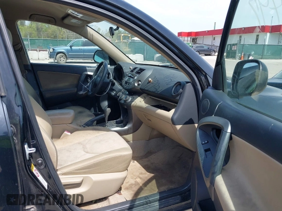 2009 Toyota RAV4 with VIN JTMZF33V29D004278, listed as a IAAI auction lot 42083497 with 218,217 mi miles. Bid and sale history available at carsss.com. Image 5.