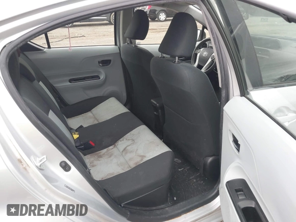 2014 Toyota Prius One with VIN JTDKDTB35E1557798, listed as a IAAI auction lot 41753972 with 182,543 mi miles and . Bid and sale history available at DreamBid. Image 8.
