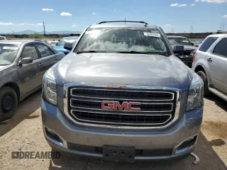 2020 GMC Yukon SLE with VIN 1GKS2AKC5LR120705, listed as a Copart auction lot 72464444 with 69,799 mi miles and Salvage Title. Bid and sale history available at carsss.com. Image 5.