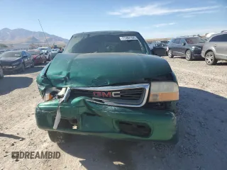 2000 GMC Jimmy SLE Convenience with VIN 1GKDT13W3Y2215035, listed as a Copart auction lot 77484104 with 116,124 mi miles and Salvage Title. Bid and sale history available at carsss.com. Image 5.
