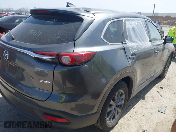 2021 Mazda CX-9 Touring with VIN JM3TCACY2M0502016, listed as a IAAI auction lot 41825456 with 86,068 mi miles. Bid and sale history available at carsss.com. Image 4.
