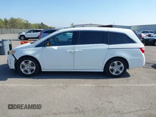 2011 Honda Odyssey Touring с VIN 5FNRL5H92BB009995, выставлен на аукционе IAAI как лот 42147249 с пробегом 139 543 миль миль и . История ставок и продаж доступна на DreamBid. Изображение 14.