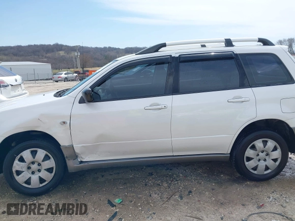 2004 Mitsubishi Outlander LS z VIN JA4LZ31F04U060022, wystawiony jako IAAI lot #41775408 z przebiegiem 83 515 mil mil oraz . Historia ofert i sprzedaży dostępna na DreamBid. Obrazek 14.