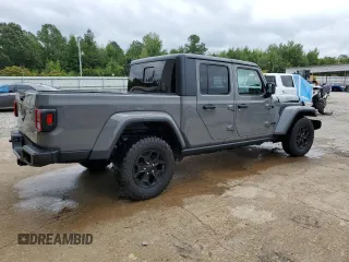 2021 Jeep Gladiator Sport S с VIN 1C6HJTAG1ML599287, выставлен на аукционе Copart как лот 71597864 с пробегом 23 186 миль миль и Списание • Salvage title. История ставок и продаж доступна на DreamBid. Изображение 3.
