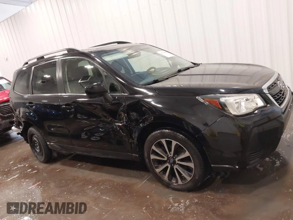 2017 Subaru Forester Premium with VIN JF2SJGEC9HH448561, listed as a IAAI auction lot 41776350 with 97,077 mi miles. Bid and sale history available at carsss.com. Image 14.