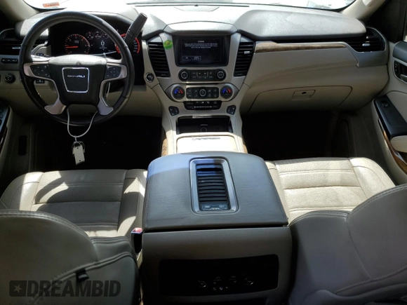 2015 GMC Yukon XL Denali with VIN 1GKS2JKJ3FR585809, listed as a Copart auction lot 48219925 with 191,102 mi miles and Salvage Title. Bid and sale history available at DreamBid. Image 8.