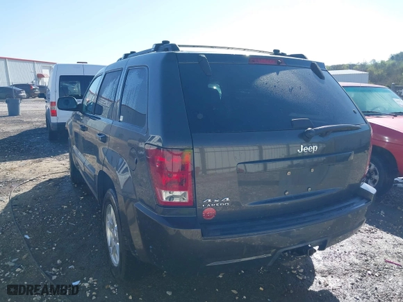 2006 Jeep Grand Cherokee Laredo with VIN 1J4GR48K56C326847, listed as a IAAI auction lot 41972623 with 141,088 mi miles. Bid and sale history available at carsss.com. Image 3.