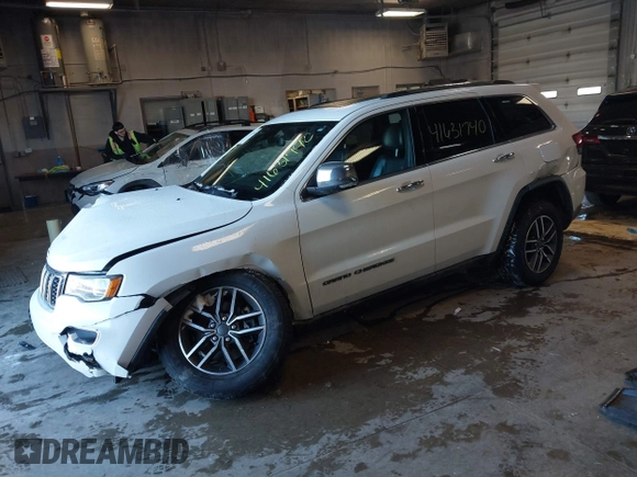 2021 Jeep Grand Cherokee 80th Anniversary with VIN 1C4RJFBG7MC611827, listed as a IAAI auction lot 41631740 with 85,253 mi miles and . Bid and sale history available at DreamBid. Image 18.