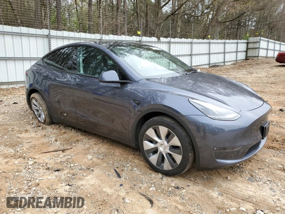2023 Tesla Model Y Long Range z VIN 7SAYGDEE5PA164270, wystawiony jako Copart lot #50260835 z przebiegiem 17 340 mil mil oraz Szkoda całkowita • Salvage title. Historia ofert i sprzedaży dostępna na DreamBid. Obrazek 4.