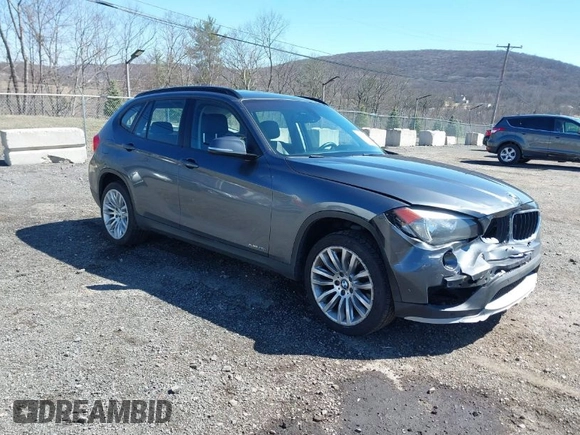 2015 BMW X1 xDrive28i with VIN WBAVL1C59FVY25442, listed as a IAAI auction lot 41854794 with 98,432 mi miles. Bid and sale history available at carsss.com. Image 1.