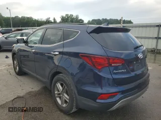 2018 Hyundai Santa Fe 2.4L z VIN 5XYZU3LB2JG537457, wystawiony jako Copart lot #56800005 z przebiegiem 97 344 mil mil oraz Szkoda całkowita • Salvage title. Historia ofert i sprzedaży dostępna na DreamBid. Obrazek 2.