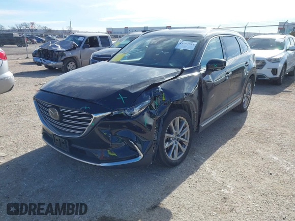 2017 Mazda CX-9 Grand Touring with VIN JM3TCBDYXH0131388, listed as a IAAI auction lot 41252943 with 61,027 mi miles. Bid and sale history available at carsss.com. Image 17.